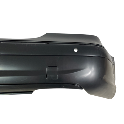 Bară spate tuning pentru Mercedes W211 E-Class (2002-2009) - Design AMG cu orificii pentru senzori de parcare