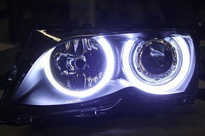 Faruri tuning pentru BMW E46 sedan (1998-2001) - negre cu angel eyes LED